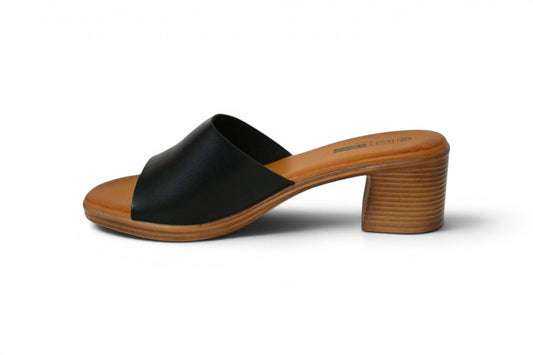 zueco de color negro y tacón bajo efecto madera de talla grande para mujer